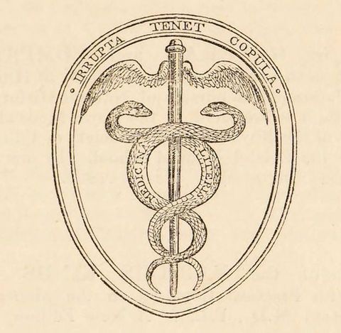Insignia. This printer’s mark shows a caduceus, a winged staff between spiralling snakes, set into an oval. One snake is labelled “Medicina” and the other “Literis” (medicine and literature). A Latin inscription around the edge of the oval reads, “Irrutpta Tenet Copula” (unbreakable bond unites).